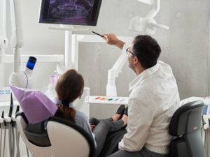 Orthodontist Talking with Patient